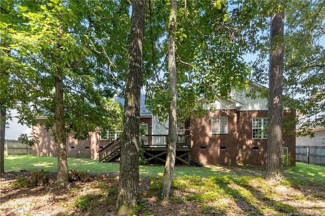 8017 Trout Creek Rd, Fayetteville, NC 28304 - back of house with crawl space, stairway, a deck, and brick siding