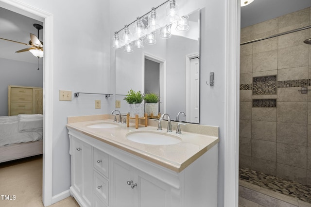 103 Wyseferry Ct, Morrisville, NC 27560 - ensuite bathroom featuring ceiling fan, double vanity, and tiled shower