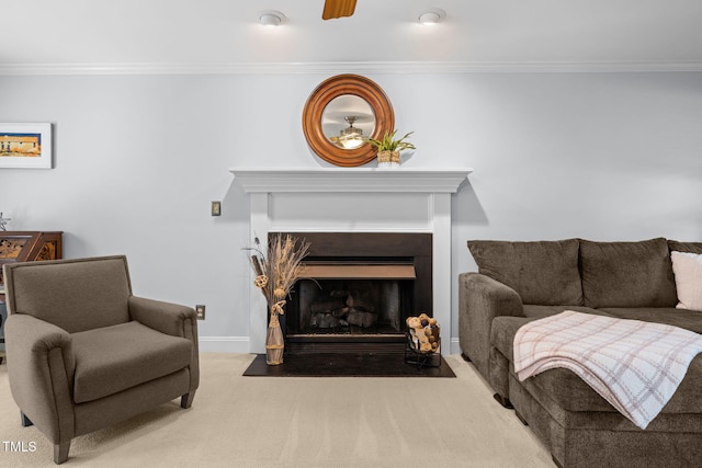 103 Wyseferry Ct, Morrisville, NC 27560 - carpeted living room featuring crown molding, a fireplace with flush hearth, and ceiling fan