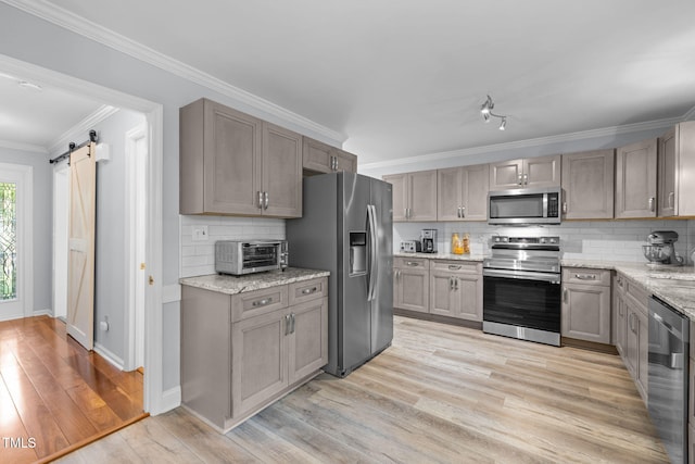 103 Wyseferry Ct, Morrisville, NC 27560 - kitchen featuring stainless steel appliances, decorative backsplash, light wood-style flooring, light stone countertops, and a barn door