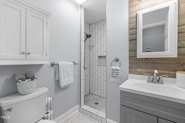 103 Wyseferry Ct, Morrisville, NC 27560 - full bath featuring tiled shower, vanity, tile patterned flooring, and wood walls