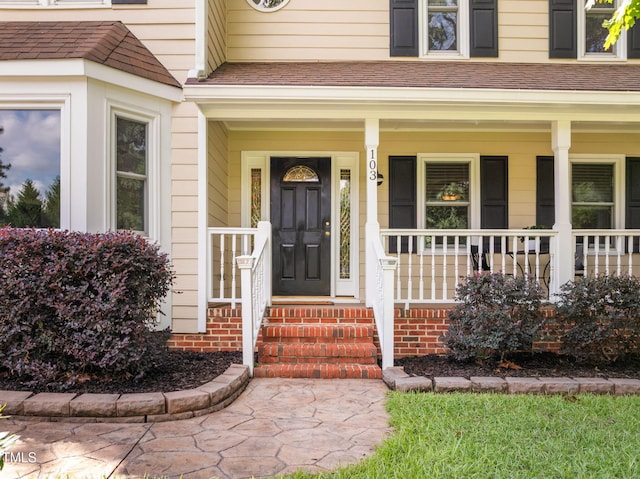 103 Wyseferry Ct, Morrisville, NC 27560 - doorway to property with a porch