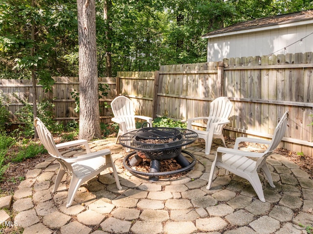 103 Wyseferry Ct, Morrisville, NC 27560 - view of patio / terrace featuring a fire pit