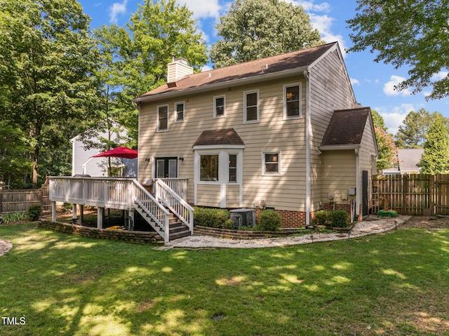 103 Wyseferry Ct, Morrisville, NC 27560 - rear view of property with a wooden deck, a fenced backyard, and a chimney