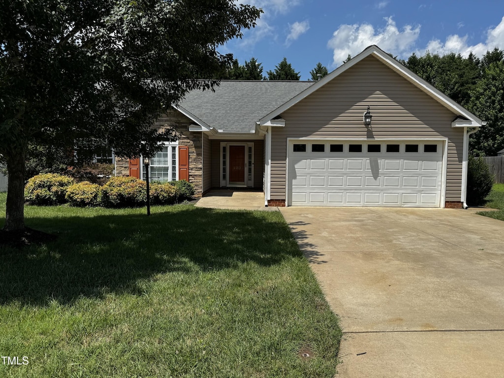 120 Cypress Ct, Gibsonville, NC 27244 - single story home featuring driveway, a front yard, a garage, and a shingled roof