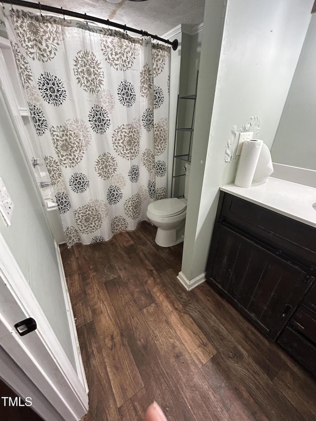 243 Victor Chandler Rd, Timberlake, NC 27583 - bathroom with wood finished floors, a shower with curtain, and vanity