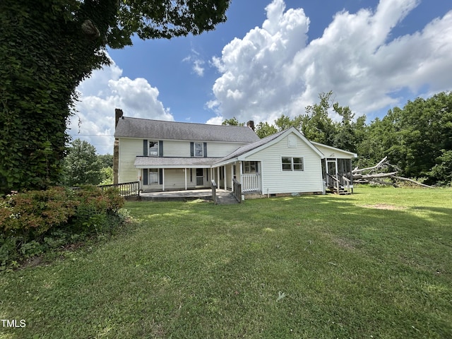 243 Victor Chandler Rd, Timberlake, NC 27583 - rear view of property with a chimney and a yard