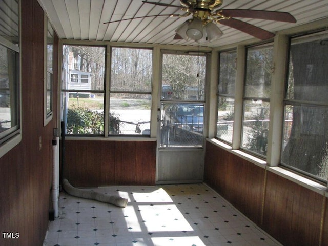 2206 E Club Blvd, Durham, NC 27704 - unfurnished sunroom featuring plenty of natural light, tile patterned floors, and wooden walls