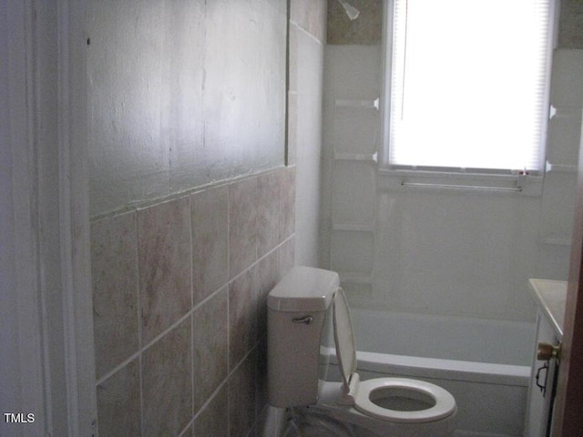 2206 E Club Blvd, Durham, NC 27704 - full bath with a bathtub, a shower, vanity, and tile walls