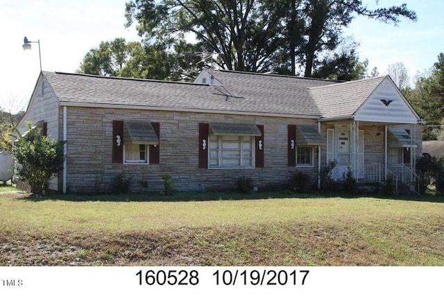 2206 E Club Blvd, Durham, NC 27704 - view of front of house featuring stone siding, a front lawn, and roof with shingles