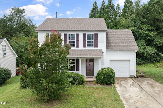 5528 Wilhagan Ct, Raleigh, NC 27616 - view of front of home featuring driveway, a shingled roof, covered porch, and a front lawn