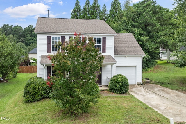 5528 Wilhagan Ct, Raleigh, NC 27616 - view of front of house featuring driveway, an attached garage, and roof with shingles