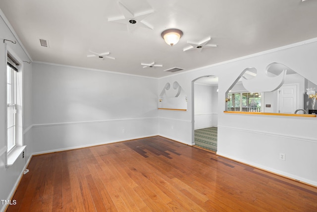 5528 Wilhagan Ct, Raleigh, NC 27616 - spare room with wood-type flooring and ornamental molding