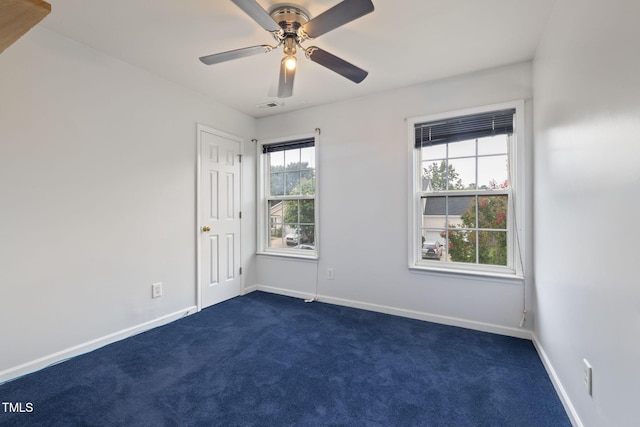 5528 Wilhagan Ct, Raleigh, NC 27616 - spare room with dark colored carpet and ceiling fan