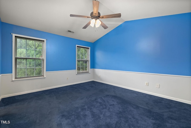 5528 Wilhagan Ct, Raleigh, NC 27616 - empty room featuring vaulted ceiling, a ceiling fan, and dark carpet