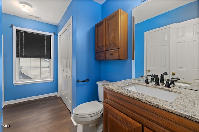 5528 Wilhagan Ct, Raleigh, NC 27616 - bathroom featuring vanity and wood finished floors