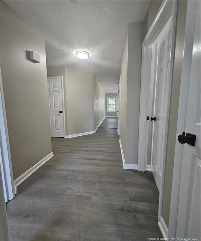6771 Willowbrook Dr Unit 6, Fayetteville, NC 28314 - hall featuring wood finished floors and a textured ceiling