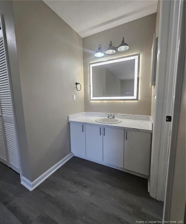 6771 Willowbrook Dr Unit 6, Fayetteville, NC 28314 - bathroom featuring wood finished floors and vanity
