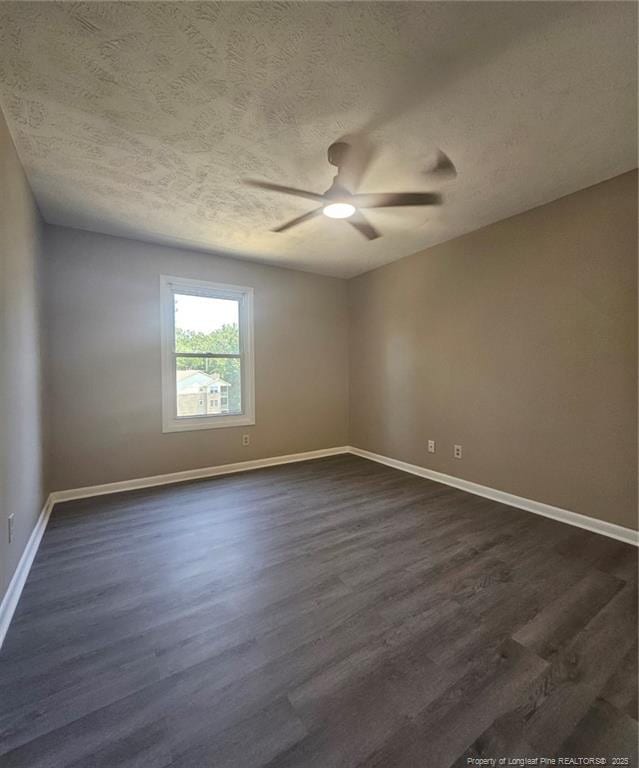 6771 Willowbrook Dr Unit 6, Fayetteville, NC 28314 - spare room featuring a ceiling fan, a textured ceiling, and dark wood finished floors