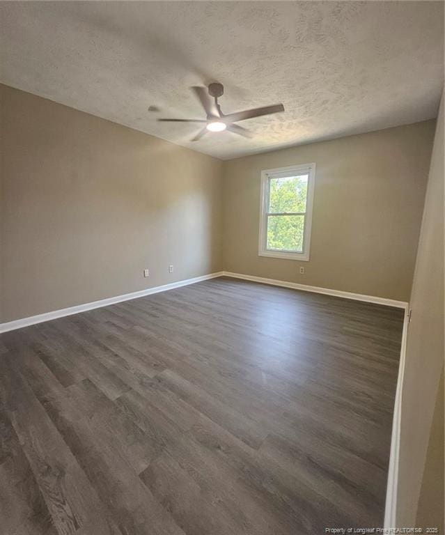 6771 Willowbrook Dr Unit 6, Fayetteville, NC 28314 - spare room with ceiling fan, dark wood-style floors, and a textured ceiling