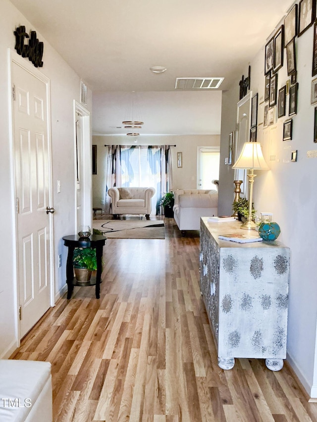 1008 Gold Cir, Mebane, NC 27302 - corridor featuring wood finished floors