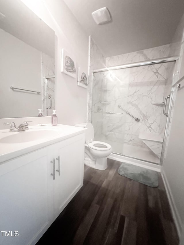 1008 Gold Cir, Mebane, NC 27302 - full bath featuring a marble finish shower, vanity, and wood finished floors