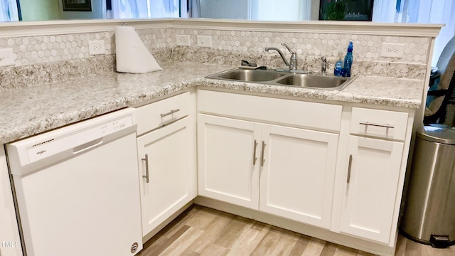 1008 Gold Cir, Mebane, NC 27302 - kitchen with white dishwasher, backsplash, light wood finished floors, and white cabinets