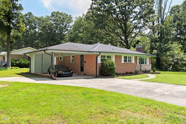 2603 Fairlawn Rd, Durham, NC 27705 - single story home featuring driveway, a chimney, brick siding, a front yard, and an attached carport