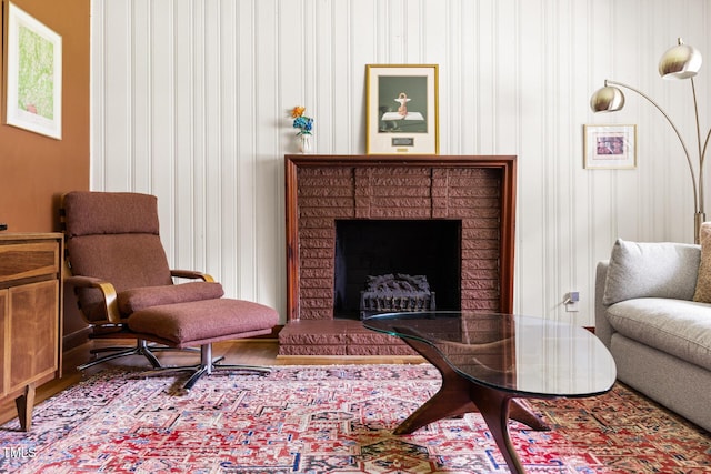 2603 Fairlawn Rd, Durham, NC 27705 - sitting room with a fireplace and wood finished floors