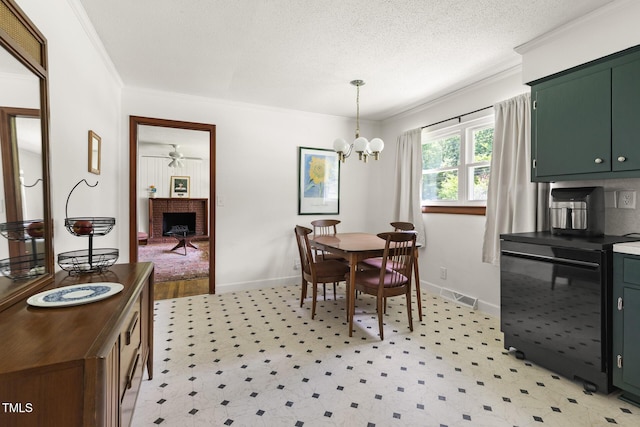 2603 Fairlawn Rd, Durham, NC 27705 - dining space with a chandelier, crown molding, light floors, and a textured ceiling