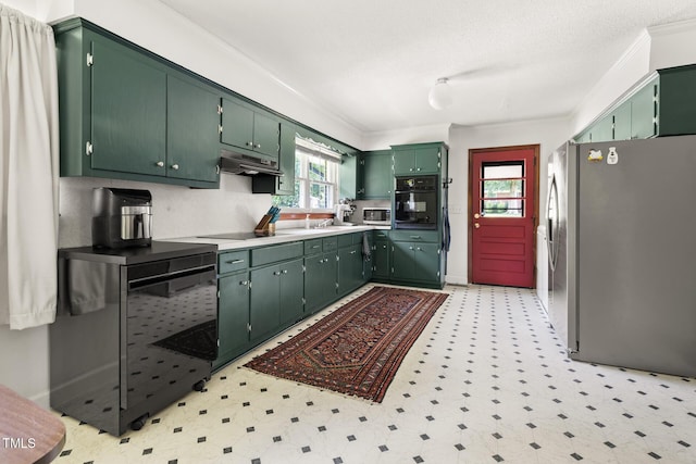 2603 Fairlawn Rd, Durham, NC 27705 - kitchen with black appliances, light flooring, under cabinet range hood, ornamental molding, and light countertops