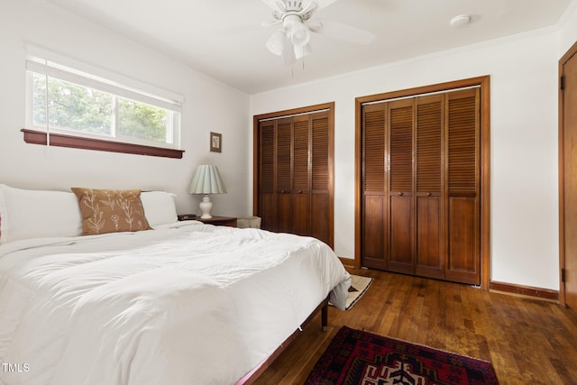 2603 Fairlawn Rd, Durham, NC 27705 - bedroom featuring multiple closets, hardwood / wood-style floors, a ceiling fan, and ornamental molding