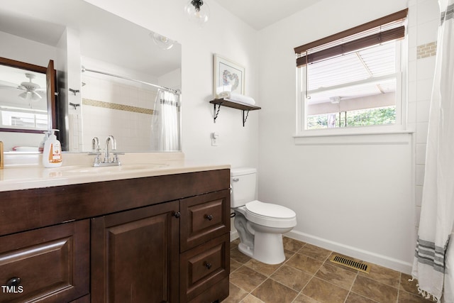 2603 Fairlawn Rd, Durham, NC 27705 - full bath with vanity, curtained shower, and a ceiling fan
