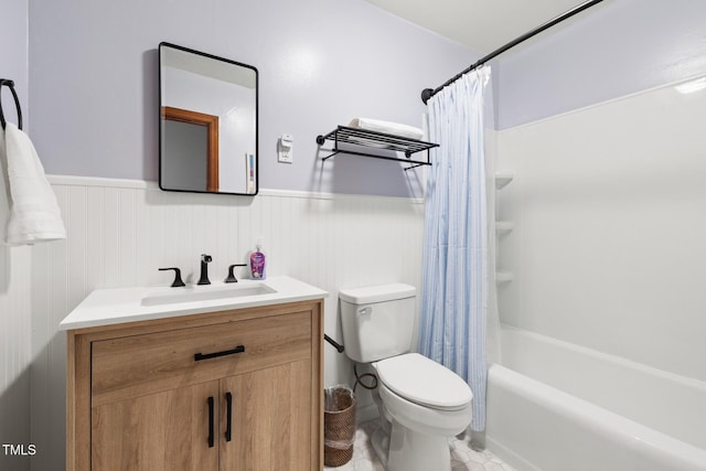 2603 Fairlawn Rd, Durham, NC 27705 - bathroom with wainscoting, vanity, shower / bath combo, and tile patterned floors
