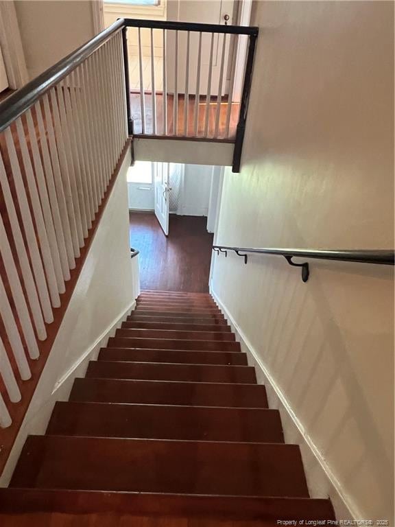 206 E 10th St, Lumberton, NC 28358 - stairway with wood finished floors and baseboards