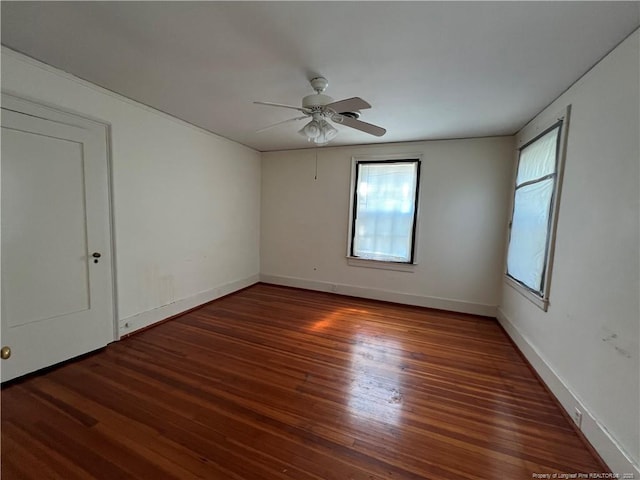 206 E 10th St, Lumberton, NC 28358 - spare room with ceiling fan and wood finished floors
