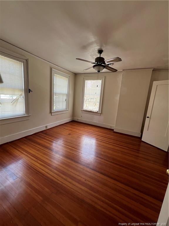 206 E 10th St, Lumberton, NC 28358 - spare room with wood finished floors and a ceiling fan