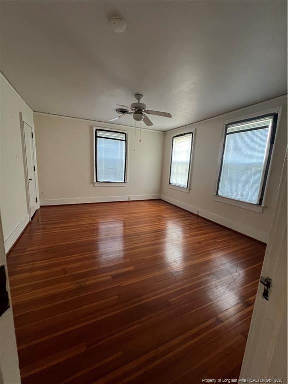 206 E 10th St, Lumberton, NC 28358 - unfurnished room featuring a ceiling fan, wood finished floors, and a smoke detector