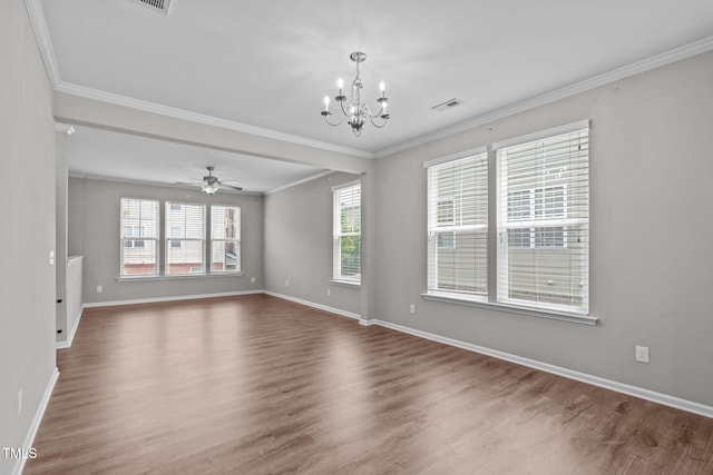 1014 Summerhouse Rd, Cary, NC 27519 - empty room featuring healthy amount of natural light, a chandelier, wood finished floors, crown molding, and a ceiling fan
