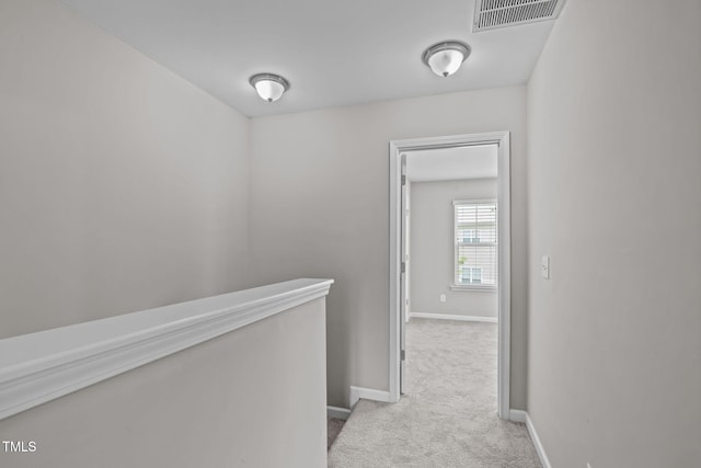1014 Summerhouse Rd, Cary, NC 27519 - hallway with carpet floors and an upstairs landing