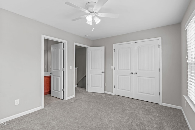 1014 Summerhouse Rd, Cary, NC 27519 - unfurnished bedroom with carpet flooring, a closet, a ceiling fan, and connected bathroom