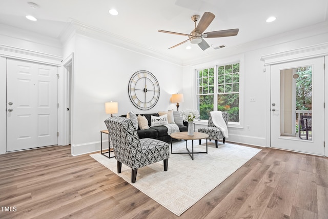 1310 Durlain Dr Unit 102, Raleigh, NC 27614 - living area featuring light wood finished floors, crown molding, ceiling fan, and recessed lighting