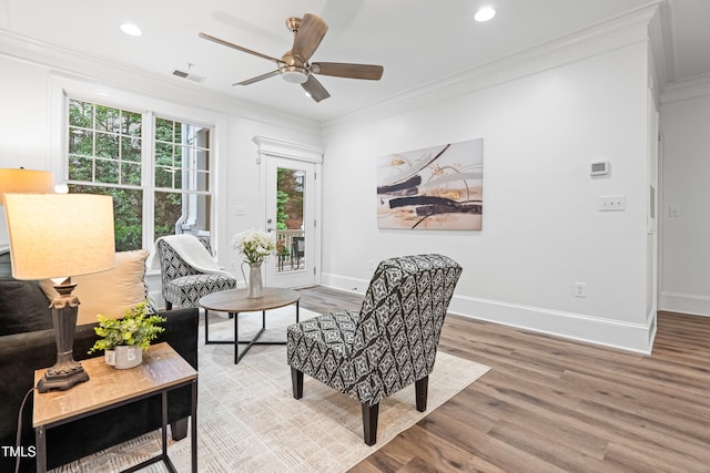 1310 Durlain Dr Unit 102, Raleigh, NC 27614 - living room featuring light wood-style floors, plenty of natural light, ceiling fan, ornamental molding, and recessed lighting