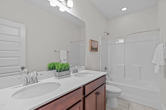 1017 Blackpool Ct, Apex, NC 27502 - bathroom featuring tile patterned floors, double vanity, and shower / tub combination