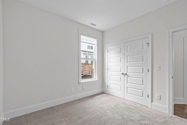 1017 Blackpool Ct, Apex, NC 27502 - unfurnished bedroom with carpet and a closet