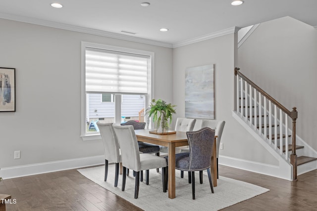 1017 Blackpool Ct, Apex, NC 27502 - dining space with plenty of natural light, crown molding, dark wood-style floors, recessed lighting, and stairs