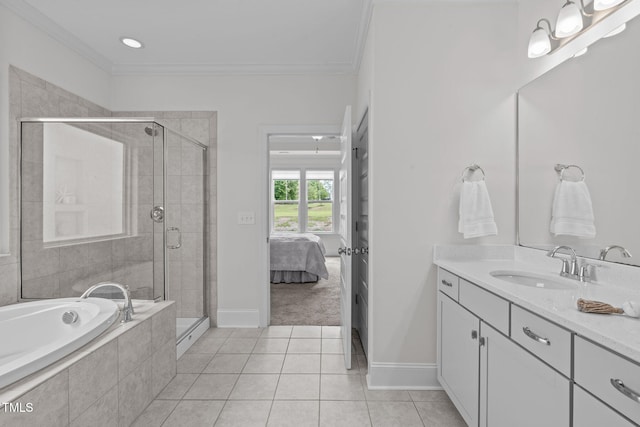 1017 Blackpool Ct, Apex, NC 27502 - ensuite bathroom featuring vanity, a shower stall, a bath, crown molding, and tile patterned floors