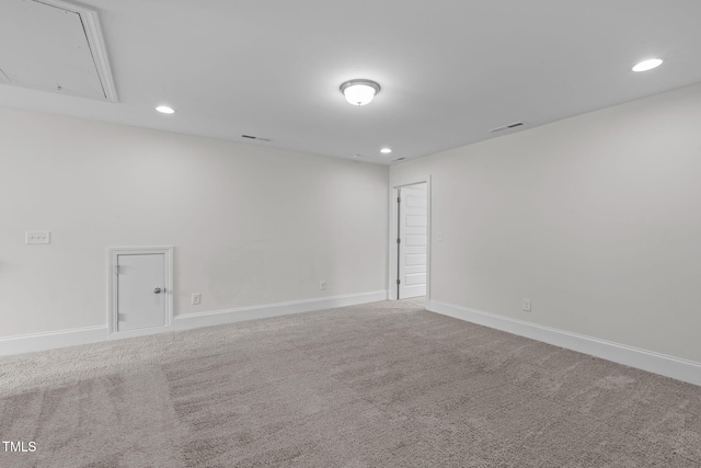1017 Blackpool Ct, Apex, NC 27502 - empty room featuring carpet floors, attic access, and recessed lighting