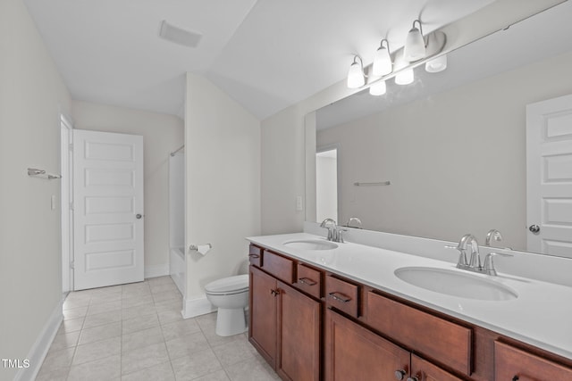 1017 Blackpool Ct, Apex, NC 27502 - bathroom featuring double vanity, tile patterned floors, and shower / tub combination