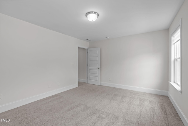 1017 Blackpool Ct, Apex, NC 27502 - unfurnished room with plenty of natural light and carpet flooring